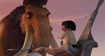 Movie still from “Ice Age” (2002), directed by Chris Wedge – An animated scene of an elephant and a boy; Medium shot, Over the shoulder angle