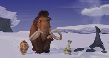 Movie still from “Ice Age” (2002), directed by Chris Wedge – An ice age scene with a woolly mammoth and other animals in the snow; Wide shot, Low angle