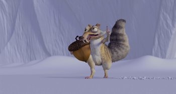 Movie still from “Ice Age” (2002), directed by Chris Wedge – An ice age character holding an acorn in his mouth; Wide shot, High angle