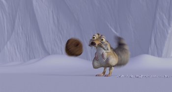 Movie still from “Ice Age” (2002), directed by Chris Wedge – An ice age squirrel is chasing an ice age creature; Wide shot, High angle