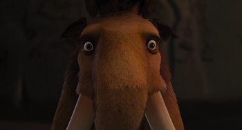 Movie still from “Ice Age” (2002), directed by Chris Wedge – An animal that is looking into the camera; Extreme Close Up shot, Low angle