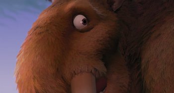 Movie still from “Ice Age” (2002), directed by Chris Wedge – An animated elephant with a big nose and a big mouth; Extreme Close Up shot, Overhead angle