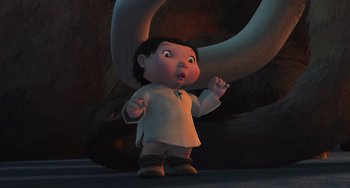 Movie still from “Ice Age” (2002), directed by Chris Wedge – An animated character is standing next to an animal; Medium shot, High angle