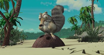 Movie still from “Ice Age” (2002), directed by Chris Wedge – An animated squirrel sitting on top of a ball; Wide shot, High angle