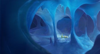 Movie still from “Ice Age: Dawn of the Dinosaurs” (2009), directed by Michael Thurmeier – An image of an ice cave with a person in the background; Extreme Wide shot, High angle