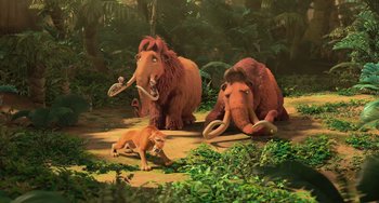 Movie still from “Ice Age: Dawn of the Dinosaurs” (2009), directed by Michael Thurmeier – A group of animals that are sitting in the grass; Wide shot, High angle