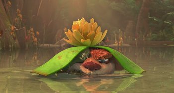 Movie still from “Ice Age: Dawn of the Dinosaurs” (2009), directed by Michael Thurmeier – An animal with a flower on its head in the water; Close Up shot, High angle
