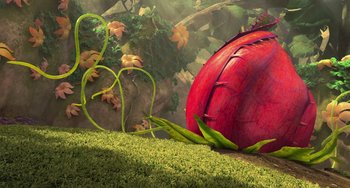 Movie still from “Ice Age: Dawn of the Dinosaurs” (2009), directed by Michael Thurmeier – An artistic rendering of an apple and a plant; Wide shot, Low angle