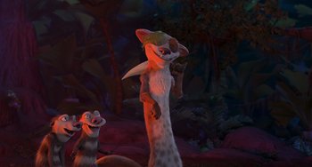 Movie still from “Ice Age: Dawn of the Dinosaurs” (2009), directed by Michael Thurmeier – A couple of animals that are standing in the dirt; Medium shot, High angle