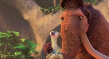 Movie still from “Ice Age: Dawn of the Dinosaurs” (2009), directed by Michael Thurmeier – An elephant and a bird in a scene from ice age : dawn of the dinosaurs; Close Up shot, Over the shoulder angle