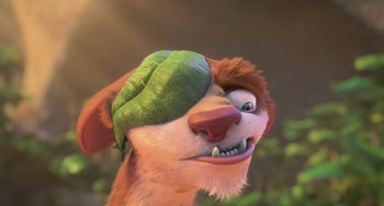 Movie still from “Ice Age: Dawn of the Dinosaurs” (2009), directed by Michael Thurmeier – An animated dog with a leaf on its head; Extreme Close Up shot, High angle