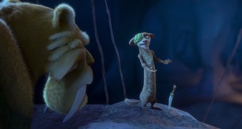 Movie still from “Ice Age: Dawn of the Dinosaurs” (2009), directed by Michael Thurmeier – An animated scene of a creature with a hat on; Wide shot, Low angle