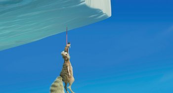 Movie still from “Ice Age: The Meltdown” (2006), directed by Carlos Saldanha – A dog standing next to a kite in the sky; Wide shot, Low angle