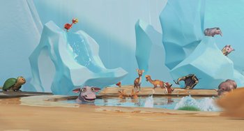 Movie still from “Ice Age: The Meltdown” (2006), directed by Carlos Saldanha – An animated scene of animals in the water; Extreme Wide shot, High angle
