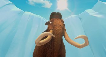 Movie still from “Ice Age: The Meltdown” (2006), directed by Carlos Saldanha – An animal that is standing in front of a mountain; Extreme Wide shot, Low angle