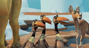 Movie still from “Ice Age: The Meltdown” (2006), directed by Carlos Saldanha – A group of three ducks standing next to each other in the water; Close Up shot, High angle