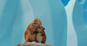 Movie still from “Ice Age: The Meltdown” (2006), directed by Carlos Saldanha – A couple of animals standing next to each other on top of a hill; Medium shot, Low angle
