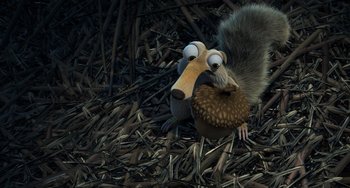 Movie still from “Ice Age: The Meltdown” (2006), directed by Carlos Saldanha – An animal with a nut in its mouth in a pile of wood; Close Up shot, Overhead angle