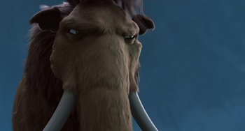 Movie still from “Ice Age: The Meltdown” (2006), directed by Carlos Saldanha – An animal with tusks and a long tail; Extreme Close Up shot, Low angle