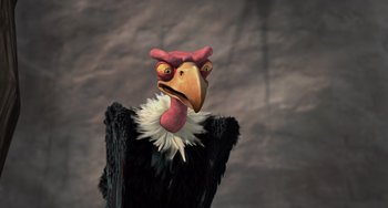 Movie still from “Ice Age: The Meltdown” (2006), directed by Carlos Saldanha – A black and white bird with a red beak and white feathers; Close Up shot, High angle