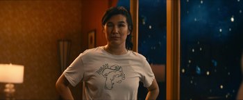 Movie still from “If You Were the Last” (2023), directed by Kristian Mercado – A woman in a white shirt is standing in front of a window; Close Up shot, Over the shoulder angle