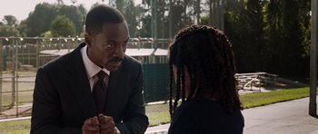 Movie still from “Imagine That” (2009), directed by Karey Kirkpatrick – A man and a woman are talking to each other; Close Up shot, Over the shoulder angle