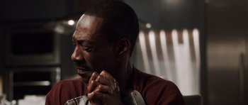 Movie still from “Imagine That” (2009), directed by Karey Kirkpatrick – A person with his hands clasped together; Close Up shot, High angle