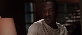 Movie still from “Imagine That” (2009), directed by Karey Kirkpatrick – A person with his eyes closed; Close Up shot, High angle