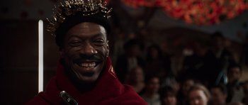 Movie still from “Imagine That” (2009), directed by Karey Kirkpatrick – A person wearing a crown; Close Up shot, Low angle