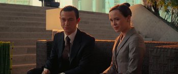 Movie still from “Inception” (2010), directed by Christopher Nolan – A man and a woman sitting next to each other; Medium shot, High angle