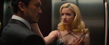 Movie still from “Inception” (2010), directed by Christopher Nolan – A man and a woman looking at each other in a mirror; Close Up shot, Low angle