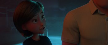 Movie still from “Incredibles 2” (2018), directed by Brad Bird – A girl looking at a man in a red hat; Close Up shot, Over the shoulder angle