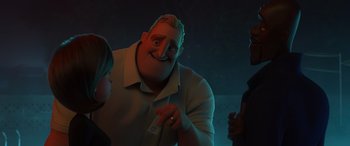 Movie still from “Incredibles 2” (2018), directed by Brad Bird – A man with a big smile on his face; Close Up shot, Over the shoulder angle