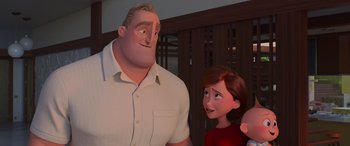 Movie still from “Incredibles 2” (2018), directed by Brad Bird – A man standing next to a woman in front of a building; Close Up shot, Over the shoulder angle