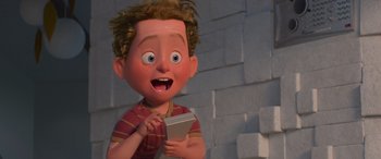 Movie still from “Incredibles 2” (2018), directed by Brad Bird – A cartoon of a boy holding a cell phone in his hands; Medium shot, Low angle