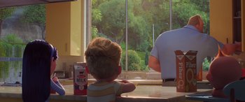 Movie still from “Incredibles 2” (2018), directed by Brad Bird – A little boy sitting in front of a large window; Medium shot, Over the shoulder angle