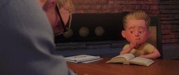 Movie still from “Incredibles 2” (2018), directed by Brad Bird – A woman and a child sitting at a table with a book; Medium shot, Over the shoulder angle