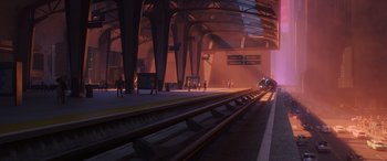 Movie still from “Incredibles 2” (2018), directed by Brad Bird – An empty train station with a train on the tracks; Extreme Wide shot, Low angle