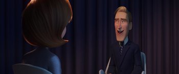 Movie still from “Incredibles 2” (2018), directed by Brad Bird – A man and a woman are talking to each other; Medium shot, Over the shoulder angle