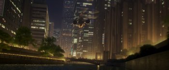 Movie still from “Incredibles 2” (2018), directed by Brad Bird – A helicopter is flying over a river at night; Extreme Wide shot, High angle