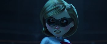 Movie still from “Incredibles 2” (2018), directed by Brad Bird – A cartoon character with glasses is looking at the camera; Close Up shot, Over the shoulder angle