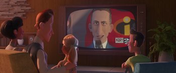 Movie still from “Incredibles 2” (2018), directed by Brad Bird – A girl and two boys are watching a cartoon on a television screen; Medium shot, Over the shoulder angle