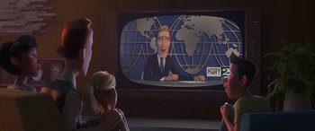 Movie still from “Incredibles 2” (2018), directed by Brad Bird – A television screen with a cartoon of a man on a tv screen; Medium shot, Over the shoulder angle