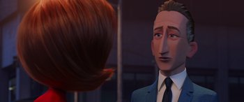 Movie still from “Incredibles 2” (2018), directed by Brad Bird – A man in a suit and tie looking at a woman in a blue suit; Close Up shot, Over the shoulder angle