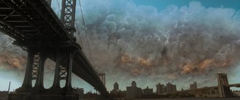 Movie still from “Independence Day” (1996), directed by Roland Emmerich – A view of a bridge and a large cloud of smoke; Extreme Wide shot, Low angle