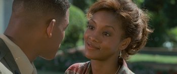 Movie still from “Independence Day” (1996), directed by Roland Emmerich – A man and a woman talking to each other; Close Up shot, Over the shoulder angle