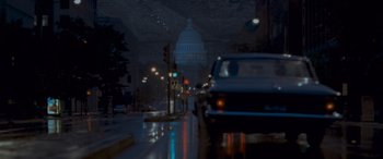 Movie still from “Independence Day” (1996), directed by Roland Emmerich – A view of the capitol building at night from the street; Extreme Wide shot, Low angle