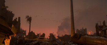 Movie still from “Independence Day” (1996), directed by Roland Emmerich – Birds flying in the sky over a pile of rubble; Extreme Wide shot, Low angle