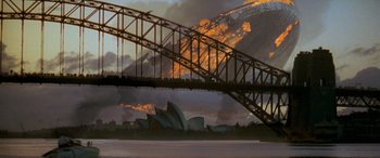 Movie still from “Independence Day” (1996), directed by Roland Emmerich – A view of the sydney opera house from across the river; Extreme Wide shot, Low angle