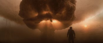 Movie still from “Indiana Jones and the Kingdom of the Crystal Skull” (2008), directed by Steven Spielberg – A man standing in front of an exploding mushroom cloud; Extreme Wide shot, Low angle